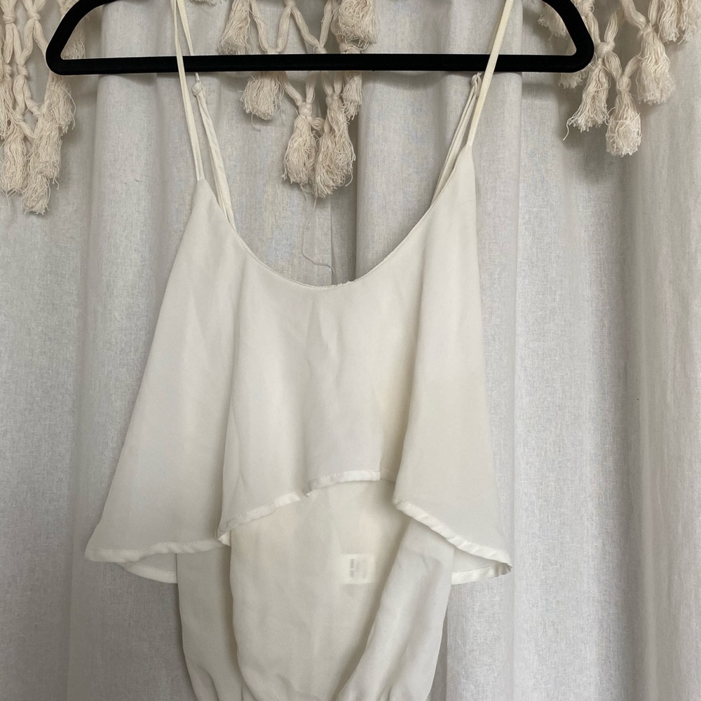 white blouse with open back